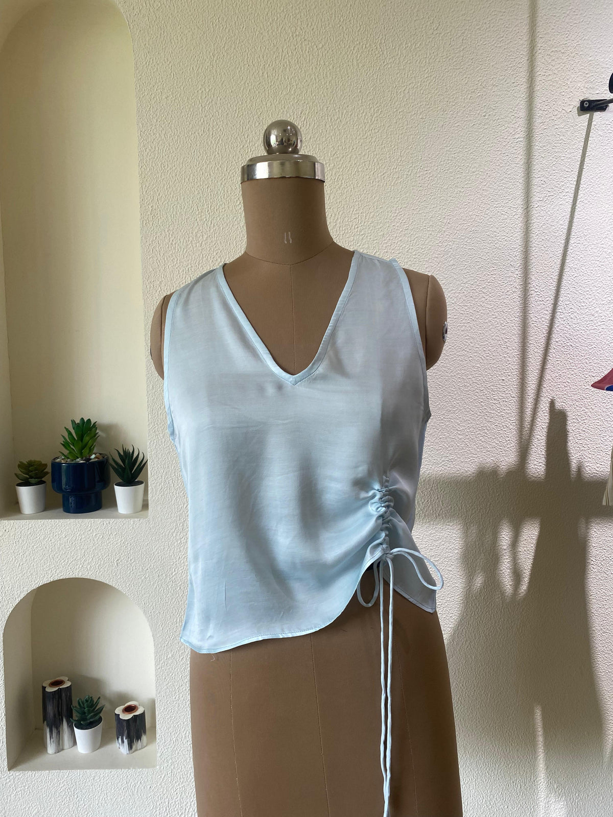 Light blue top